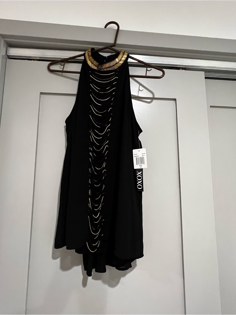XOXO Black Top with Gold Accent Neckline
